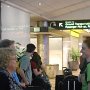 Meghan and Kim carry on conversation as we wait in line to check in for our flight.