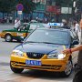 As you will likely discover in future pictures, traffic flows in a very different way than in the United States.  Here, a taxi drives up onto the sidewalk since there was room there.