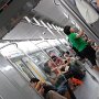 The subway car during a quieter time.  Beijing has replaced many cars and most were air conditioned.