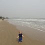 Walking alone on the beach in Thailand.