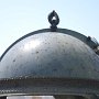 The Celestial Globe at the Historical Observatory gleams in the sunlight.