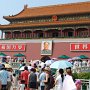 The entrance to the Forbidden City near the square is full of visitors, local and foreign.