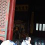 The throne room in the Hall of Preserving Harmony.  Many visitors crowded around the small opening to take pictures.