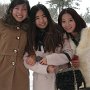 A few of my students huddle in close after class. Yes, they all have the exact same purse!