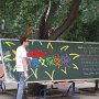 Students paint a welcome sign for the International Exchange College students.