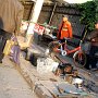 A group of bike repair guys off the corner of our street.