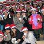 Many students turned out for the party, all donned with Santa hats.