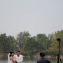 A day of wedding pictures for a couple on the dock.