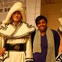 Two models wear art students' designs during an end-of-year fashion show on campus.