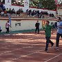 Jon runs alongside a teacher from the Computer Science department during the 1500 meter.