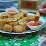 Spring rolls with sweet and sour sauce.