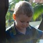 Daniel carefully navigates a playground.